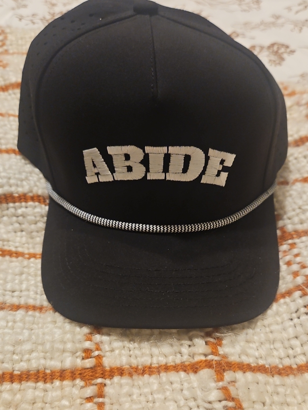ABIDE Black Trucker Hat